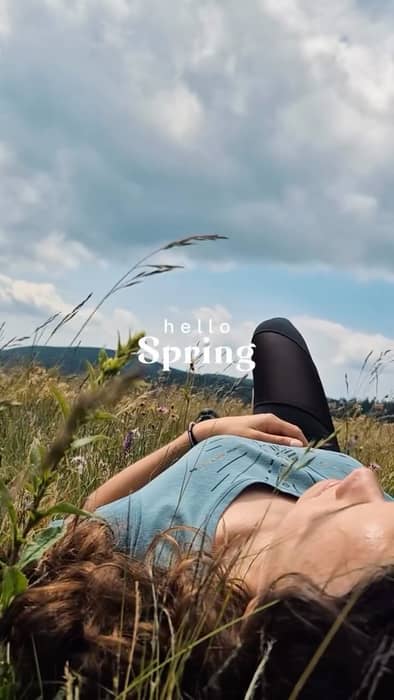 A spring getaway in a meadow with views of the green landscape.