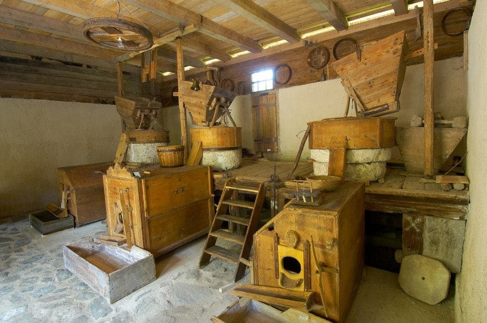 The preserved mill mechanism and wooden parts of the equipment bear witness to the former method of grain processing and the life of millers.