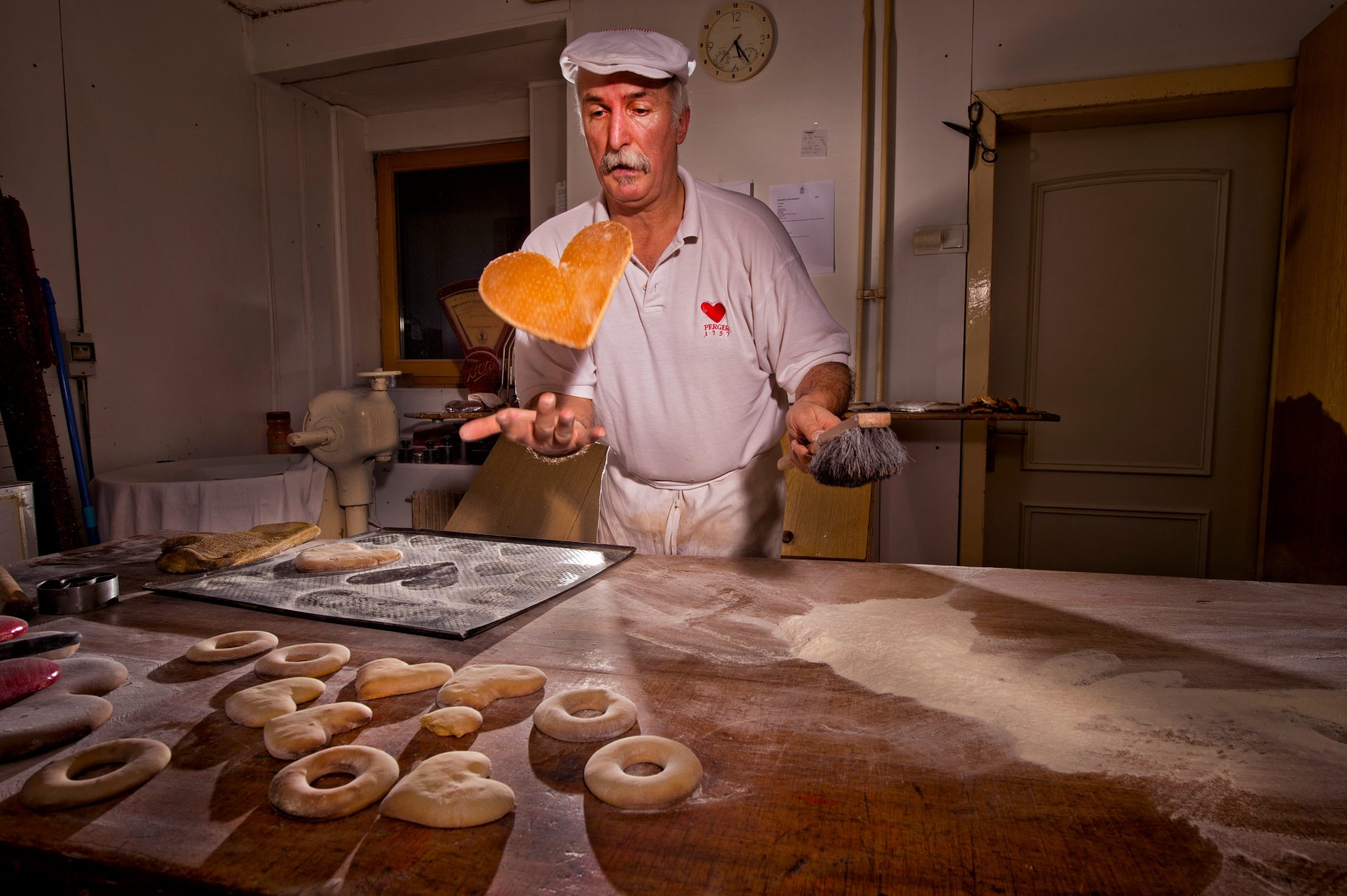 Hrabroslav Perger, a master from the PERGER 1757 family house, handcrafting traditional gingerbread products.