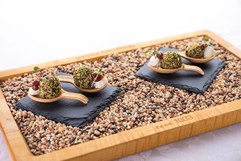 Imaginatively prepared bites served on wooden spoons.