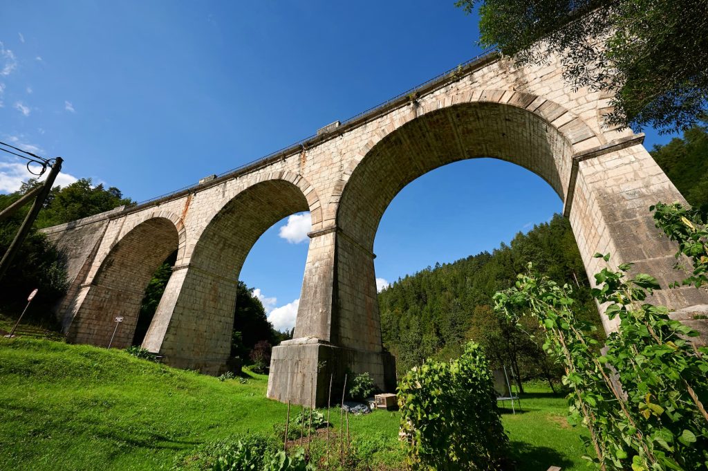 A mighty stone railway viaduct from 1863, considered one of the most beautiful railway viaducts in Slovenia.