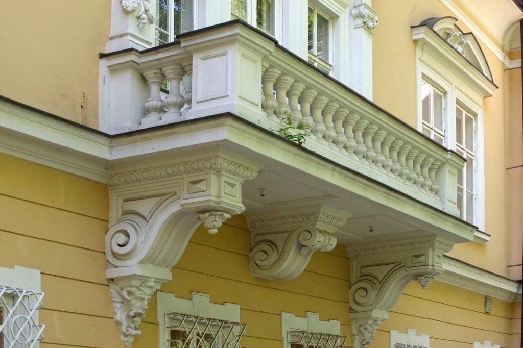A balcony detail whose architectural design complements the character of the historic castle building.