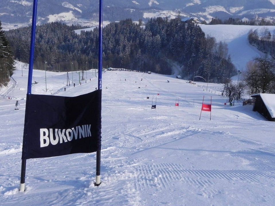 A well-groomed slope, ready for a new day of skiing.