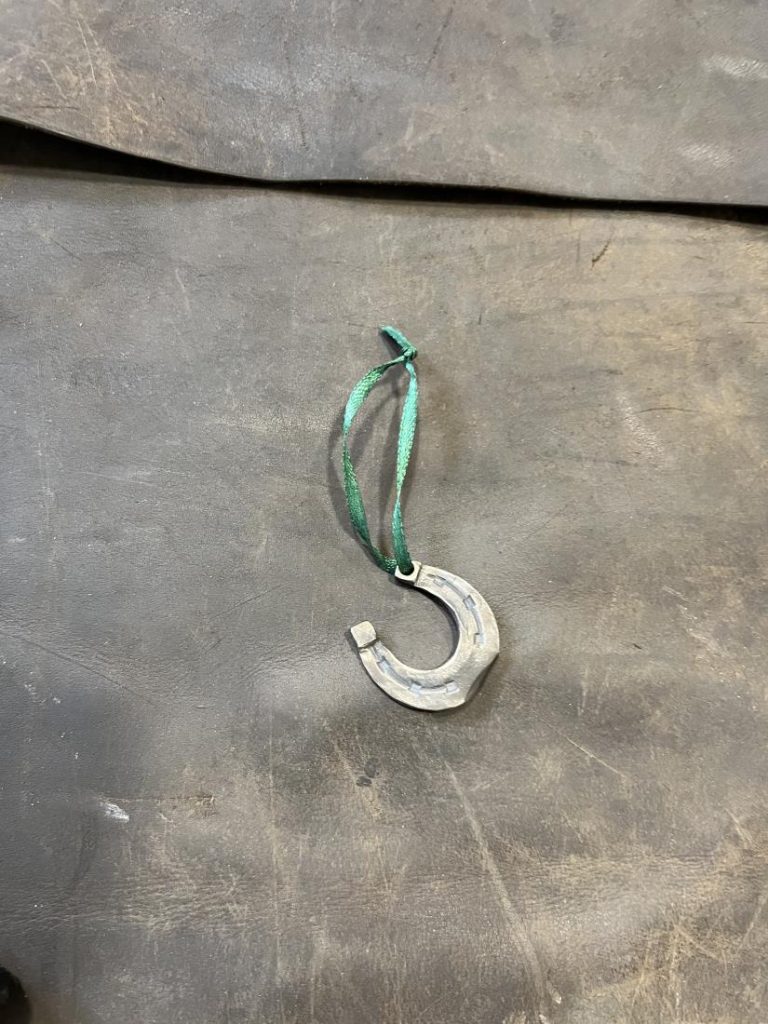 An example of a blacksmith's product - a horseshoe shaped as an original ornament for a Christmas tree.
