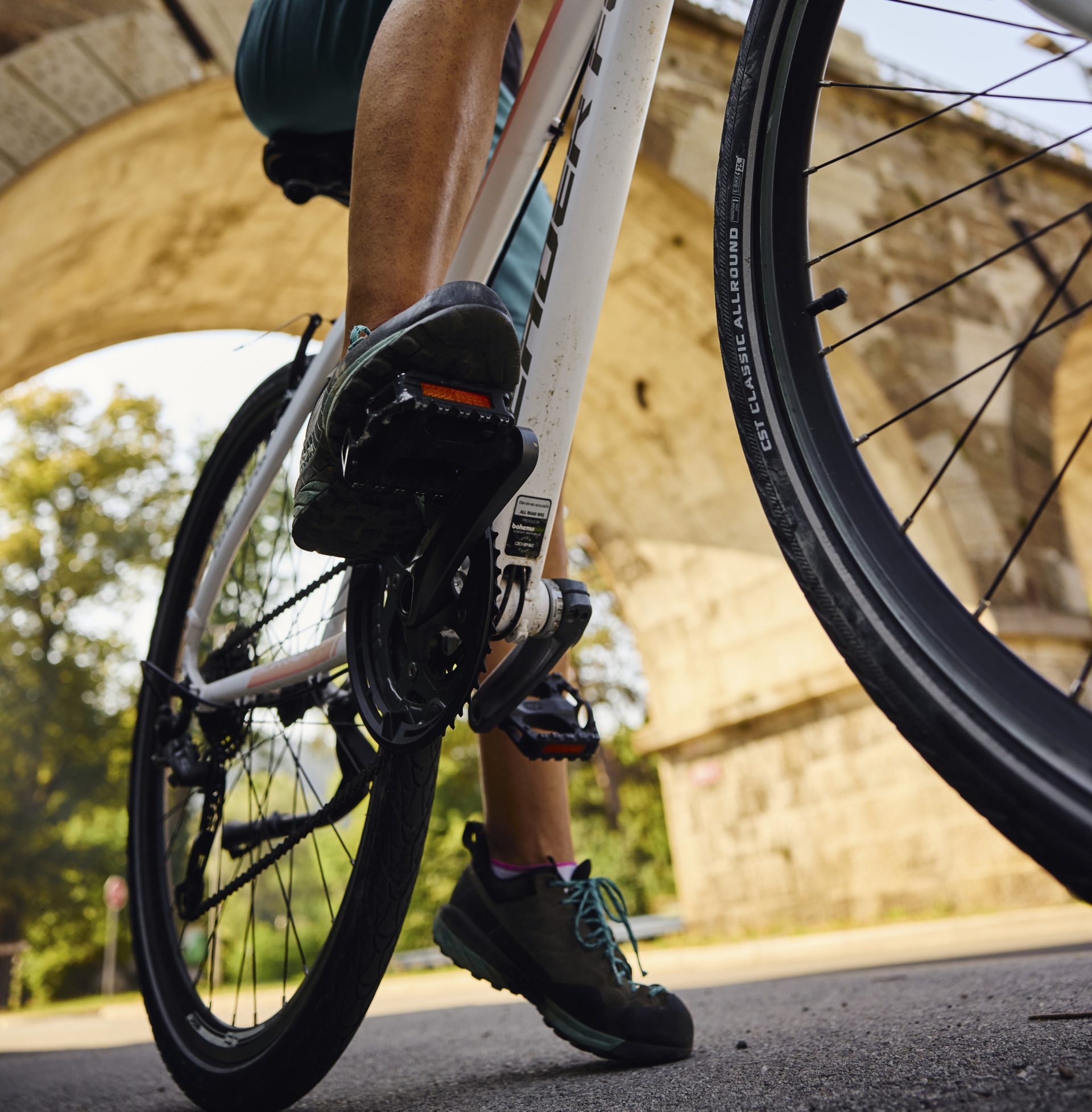 A cyclist explores the picturesque paths of the Meža Valley.
