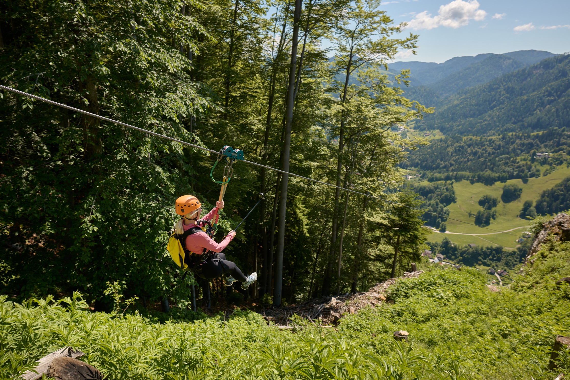 Olimpline offers a true dose of adrenaline and views of the surrounding forests, hills, and the Meža Valley.
