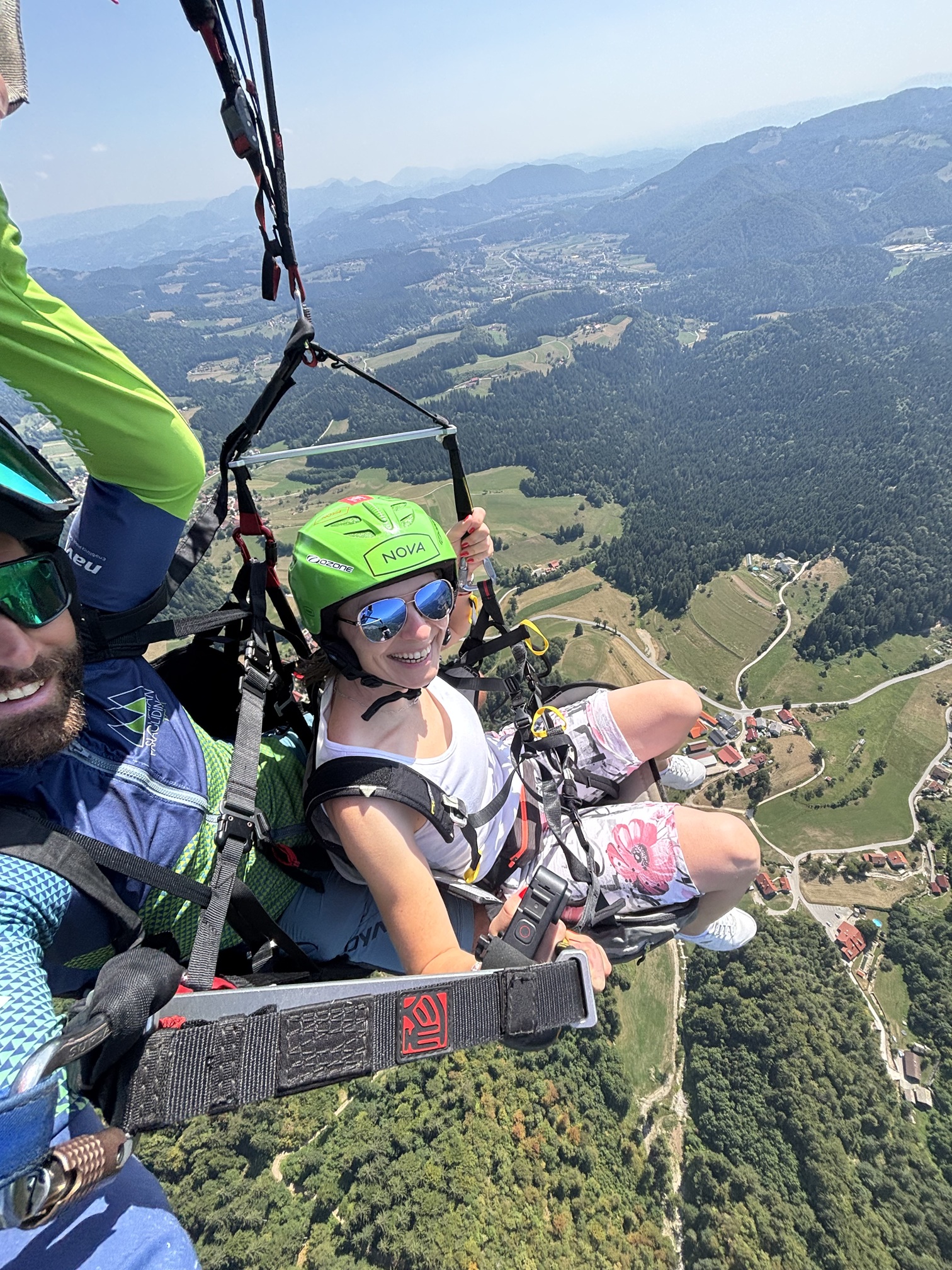 A selfie high in the air during a tandem jump.